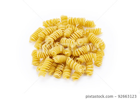 Pasta close-up. Fusilli spirale, on white background. Full depth of field. 92663123