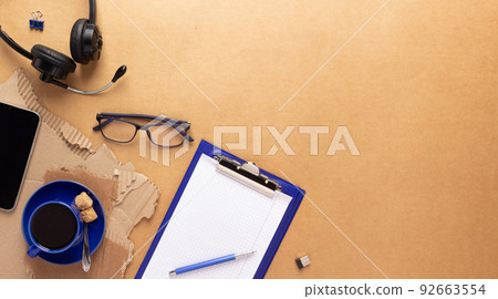 Clipboard paper and stationary supplies on table background texture. Office business concept idea Clipboard paper and stationary supplies on table background texture. Office business concept idea 92663554
