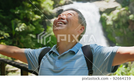 retired old man enjoy nature 92664159
