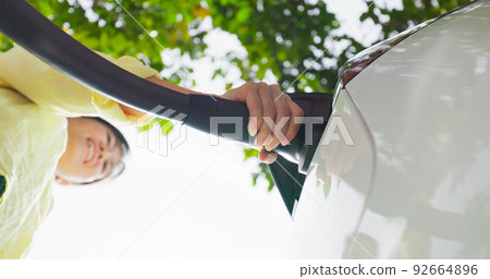 electric car charging electric car charging 92664896