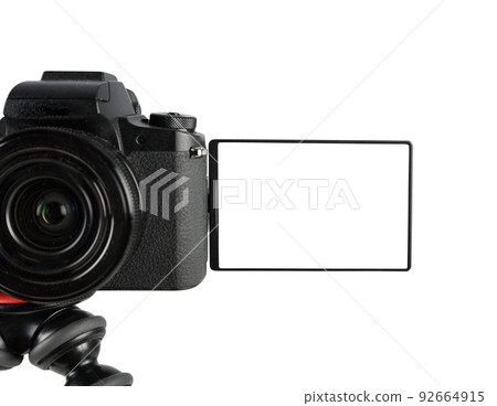 Modern mirrorless camera ready to records with blank screen Modern mirrorless camera ready to records with blank screen 92664915