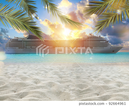 Cruiseship view from the beach with palm trees duwing sunrise Cruiseship view from the beach with palm trees duwing sunrise 92664961
