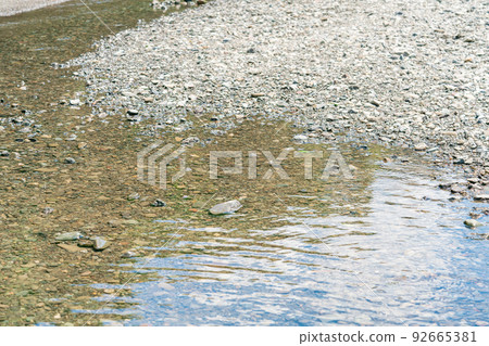 Shallows where you can play in the river Shallows where you can play in the river 92665381