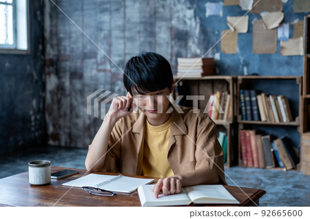 Young man studying Young man studying 92665600