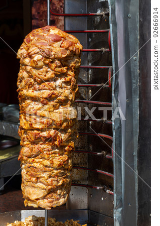 Close up shot of stacked meat roasting Close up shot of stacked meat roasting 92666914