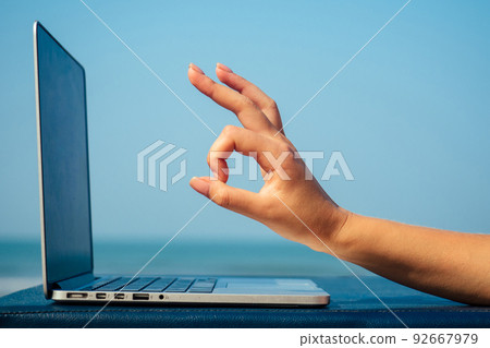 laptop on the beach laptop on the beach 92667979