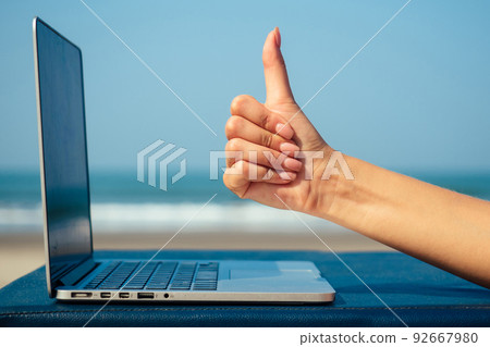 laptop on the beach laptop on the beach 92667980
