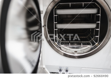 Close-up view of a medical sterilization machine Close-up view of a medical sterilization machine 92668490