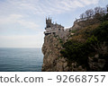 Gothic castle on the hill above the sea 92668757