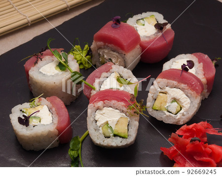 sushi rolls with tuna, cucumber, avocado and cream cheese 92669245