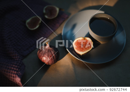 ripe fresh figs and purple textiles on rustic background, flatlay, overhead view 92672744