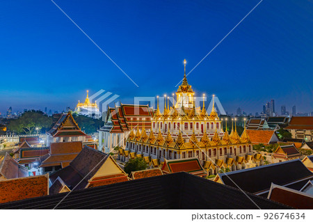 Wat Ratchanaddaram and Loha Prasat Metal Palace at night before sunrise, a tourist destination in Bangkok, Thailand 92674634