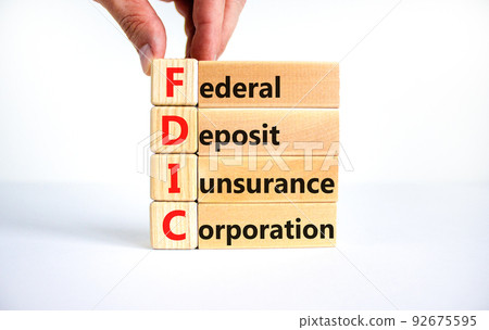 FDIC federal deposit insurance corporation symbol. Concept words FDIC federal deposit insurance corporation on blocks on white background. Business FDIC federal deposit insurance corporation concept. 92675595