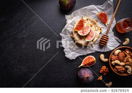Brie cheese with fresh figs 92676924