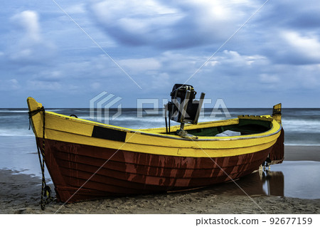 Fishing boat on Polish beach - Poland Fishing boat on Polish beach - Poland 92677159