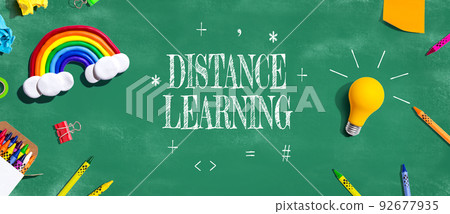 Distance Learning theme with school supplies - flat lay Distance Learning theme with school supplies - flat lay 92677935