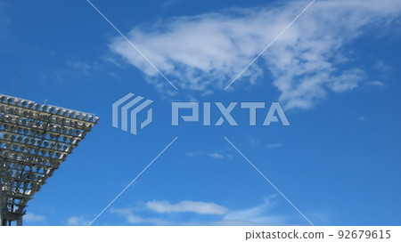 Blue sky and stadium lighting 92679615