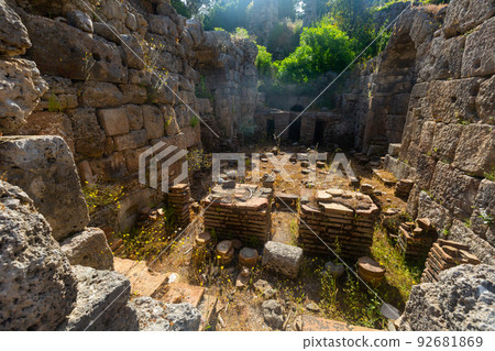 Ruins of large bath of ancient Phaselis city. Famous architectural landmark, Antalya province. Turkey Ruins of large bath of ancient Phaselis city. Famous architectural landmark, Antalya province. Turkey 92681869
