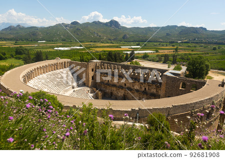 Well-preserved Roman theater of ancient city of Aspendos with green surroundings, Turkey Well-preserved Roman theater of ancient city of Aspendos with green surroundings, Turkey 92681908