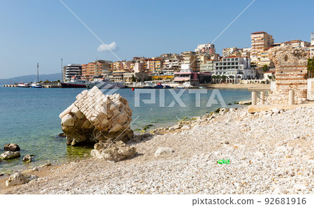 Sarande cityscape on Ionian Sea with residential area and harbor Sarande cityscape on Ionian Sea with residential area and harbor 92681916