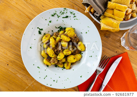 Gnocchi with aubergine and minced meat Gnocchi with aubergine and minced meat 92681977