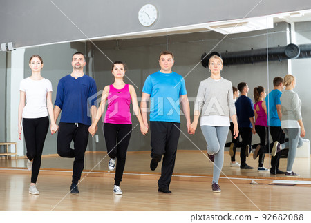 Adults rehearsing Irish stepdance 92682088
