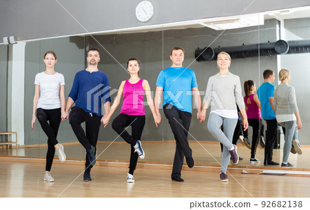 Adults rehearsing Irish stepdance 92682138