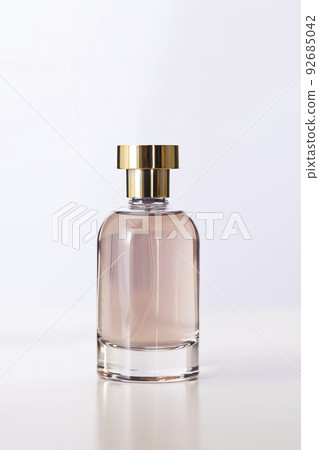 Bottle of perfume on white background 92685042