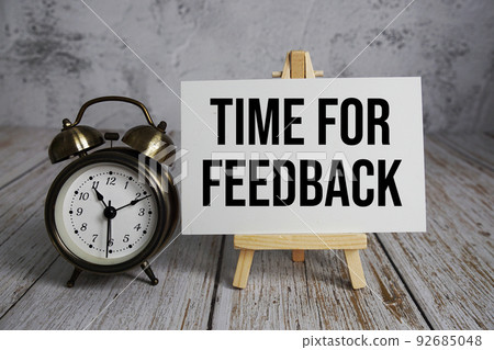 Time for Feedback text message and alarm clock on wooden background Time for Feedback text message and alarm clock on wooden background 92685048