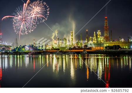 Fireworks over the night view of factories in the Sakai coastal area seen from Ishizu fishing port. composite photo 92685792