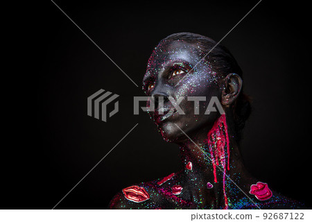 Mystical makeup of a woman in the dark Mystical makeup of a woman in the dark 92687122