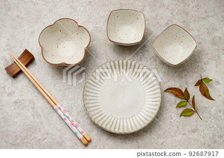 Background of autumn leaves of Nandina and tableware. Autumn of appetite. 92687917