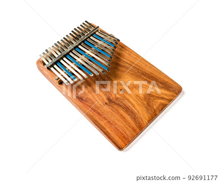 Traditional wooden kalimba isolated on white Traditional wooden kalimba isolated on white 92691177