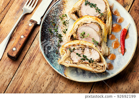 Wellington meat is a festive tenderloin dish. Wellington meat is a festive tenderloin dish. 92692199