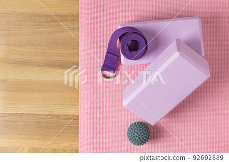 Yoga blocks, exercise mat and yoga belt for training. Yoga equipment. 92692889