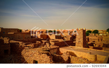 Aerial panoramic view to Chinguetti mosque, one of the symbols of Mauritania Aerial panoramic view to Chinguetti mosque, one of the symbols of Mauritania 92693044