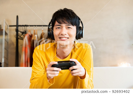 Young men playing games Young men playing games 92693402