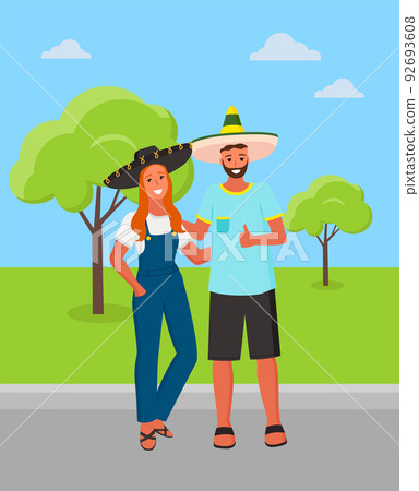 Mexican Man and Woman Wearing Sombrero Hat in Park Mexican Man and Woman Wearing Sombrero Hat in Park 92693608