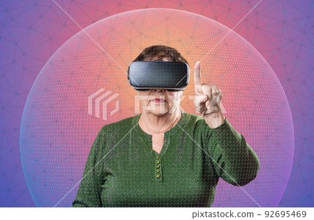 Metaverse. Futusistic technology. Portrait of caucasian senior woman in VR glasses. Pink background with neon grid and sphere. Concept of retiree, virtual reality and cyberspace Metaverse. Futusistic technology. Portrait of caucasian senior woman in VR glasses. Pink background with neon grid and sphere. Concept of retiree, virtual reality and cyberspace 92695469