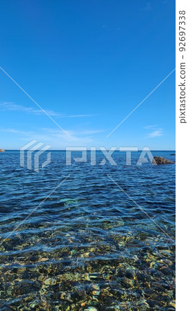 The boundary between the clear sea and the blue sky 92697338
