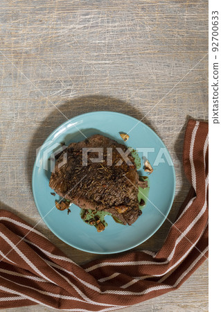 juicy steak with blood fried in a pan juicy steak with blood fried in a pan 92700633
