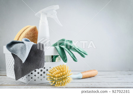 Cleaning service concept. Cleaning accessories in blue color. Cleaning service concept. Cleaning accessories in blue color. 92702281