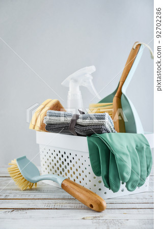 Cleaning service concept. Cleaning accessories in blue color. Cleaning service concept. Cleaning accessories in blue color. 92702286