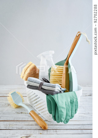 Cleaning service concept. Cleaning accessories in blue color. Cleaning service concept. Cleaning accessories in blue color. 92702288