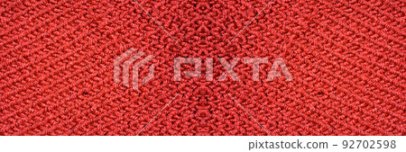 Handmade knitted fabric red wool background texture Handmade knitted fabric red wool background texture 92702598