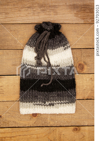 Handmade wool knitted winter white and grey hat 92703013