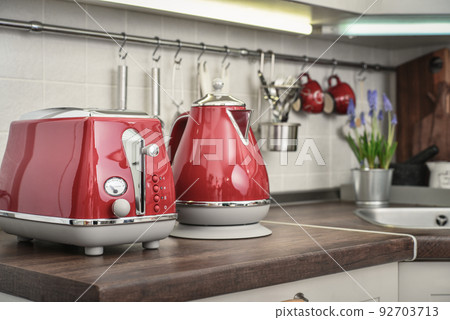 Red toaster and electric kettle in retro slile Red toaster and electric kettle in retro slile 92703713