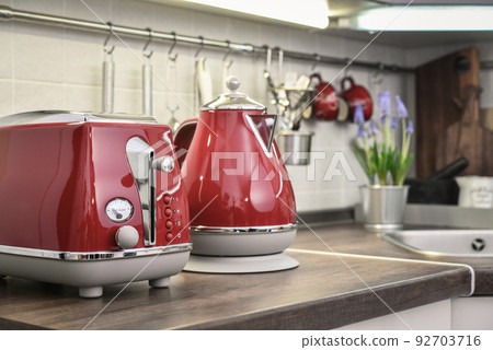 Red toaster and electric kettle in retro slile 92703716