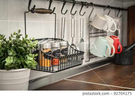 Glass jars with different spices 92704175