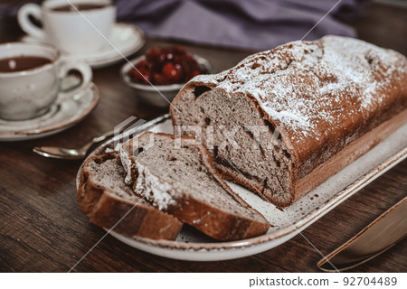 Freshly baked cake on plate 92704489